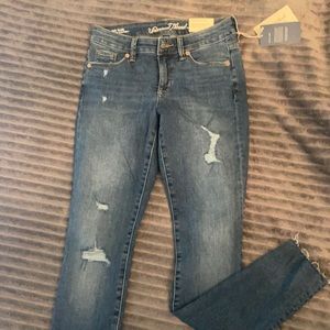 New jeans, tag still on.